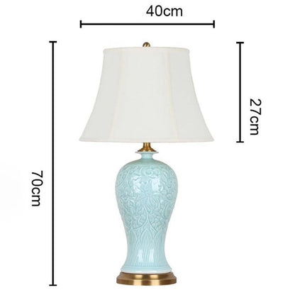 Pastel blue ceramic table lamp 70 cm tall and 40 cm wide featuring gold base and white shade ideal for premium home lighting decor.