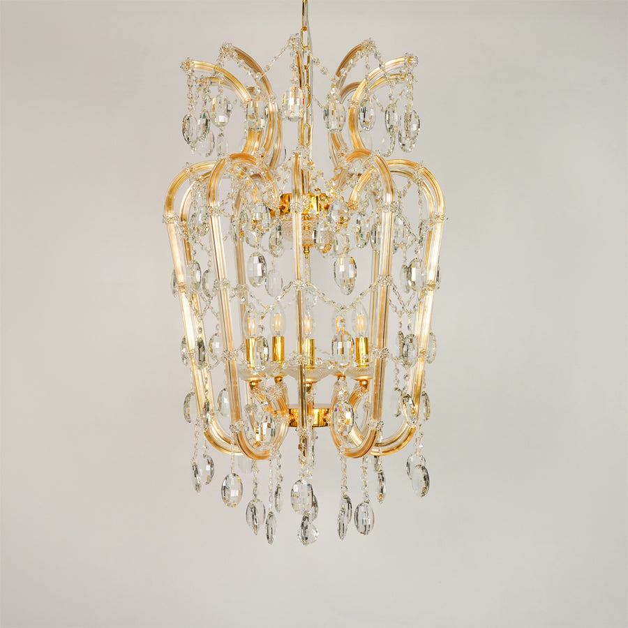 White background image of elegant clear crystal chandelier for elegant dining room decor styling with unlit crystal arms.