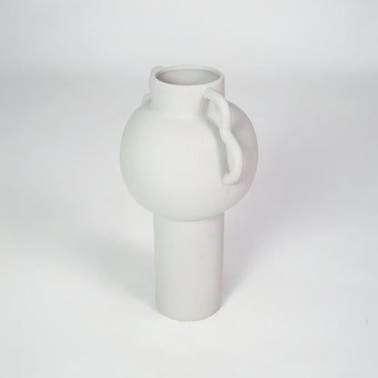 White matte ceramic vase for stylish console table placement and contemporary living room decor styling piece.