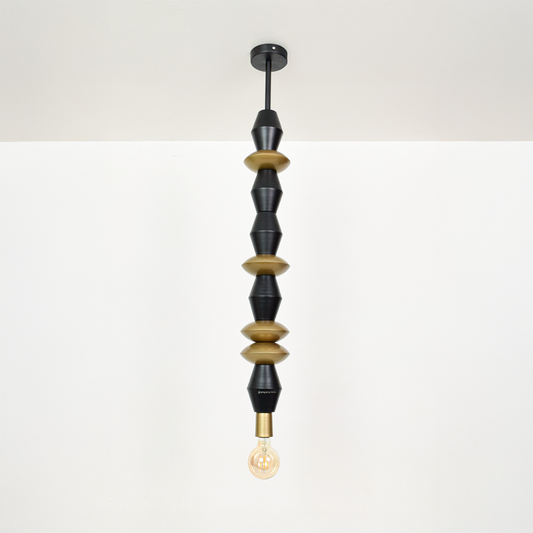 Black and gold metal pendant light with sculptural bead accents for elegant home decor spaces.