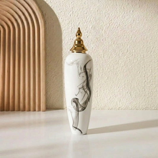 White ceramic decorative floor vase with black marble swirl design and gold lid perfect for living room corner and luxury home decor.
