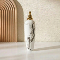 White ceramic decorative floor vase with black marble swirl design and gold lid perfect for living room corner and luxury home decor.