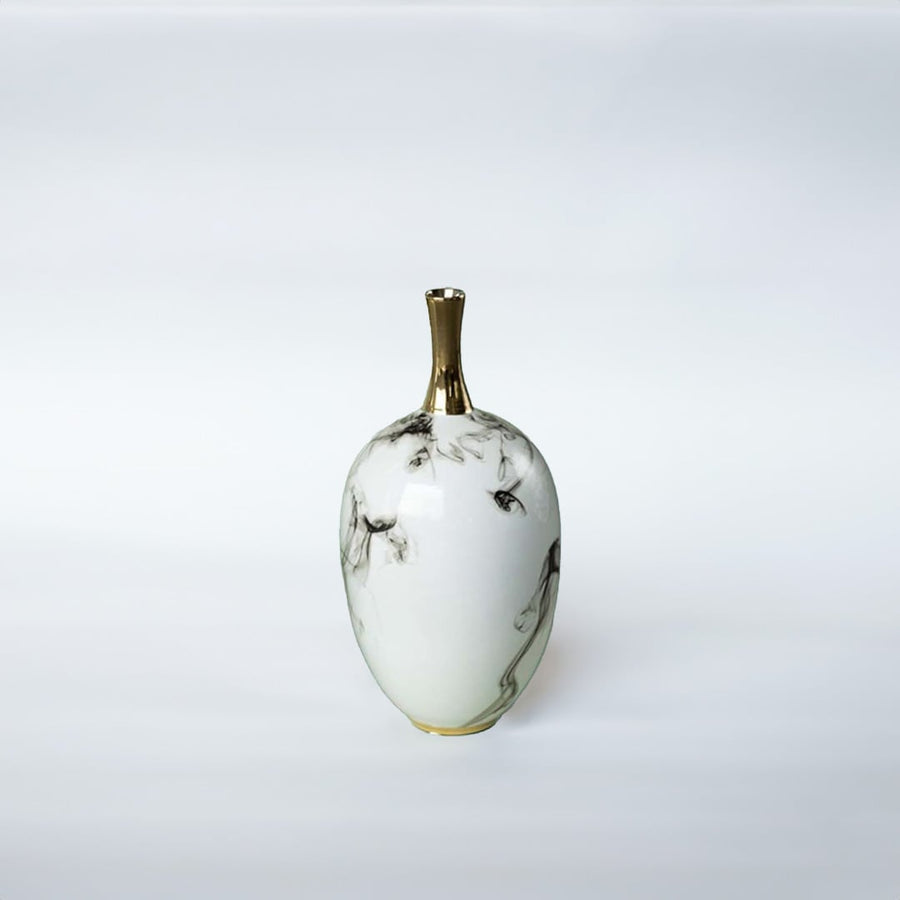 White ceramic decorative vase with grey marble pattern and gold neck for elegant shelf styling and modern home decor.