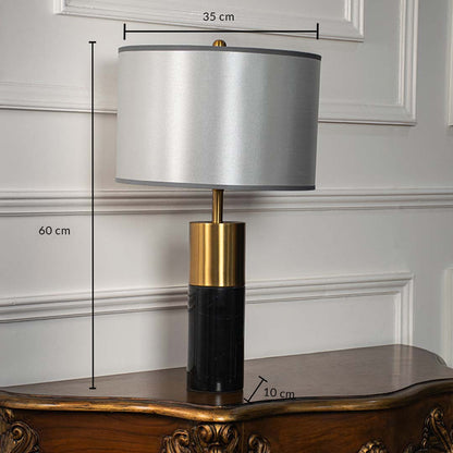 Silver shade black and gold table lamp with visible size 60cm height and 34cm width on carved console table with light off for sleek modern décor.