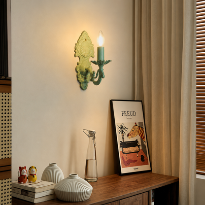 Lifestyle image of aluminium era small light wall sconce with floral white shade for elegant living room decor styling.