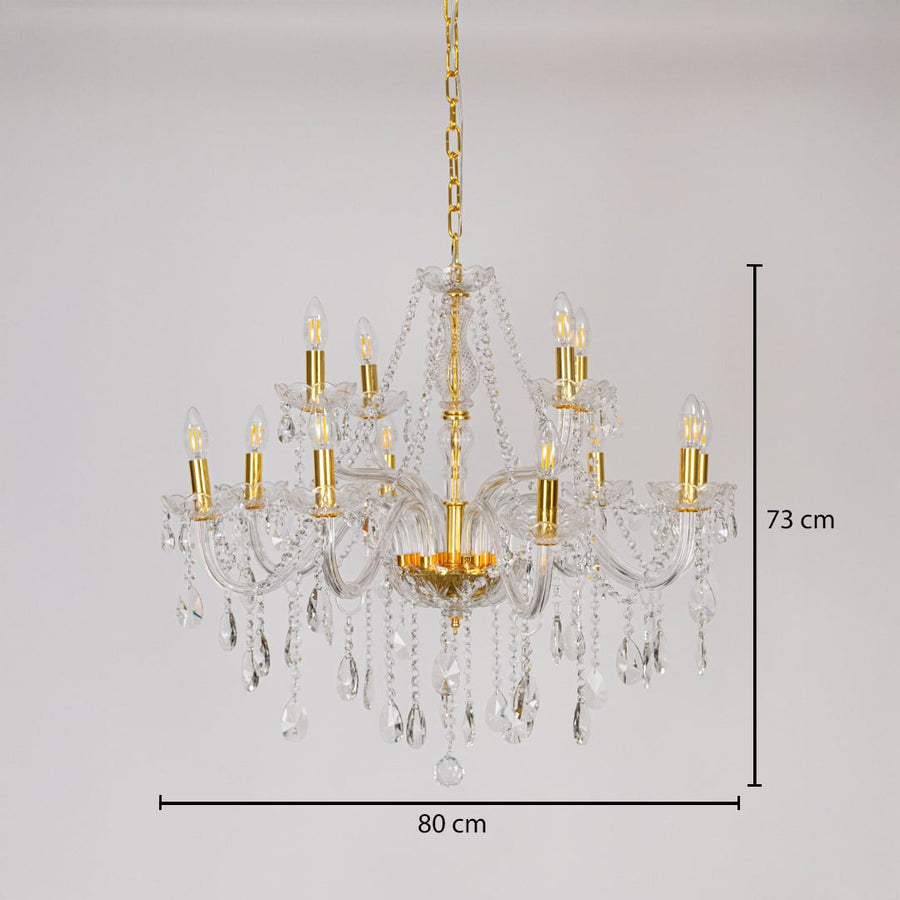 Chandelier with crystal glass and gold finish shown with 80 cm width and 73 cm height for decorative lighting.