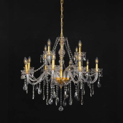 Chandelier with crystal glass and gold finish displayed off against black background for classic home style.