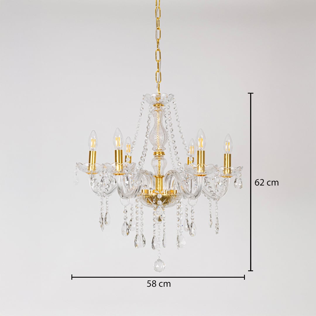 Gold chandelier with measurements 62 cm height and 58 cm width showing crystal design on white background.