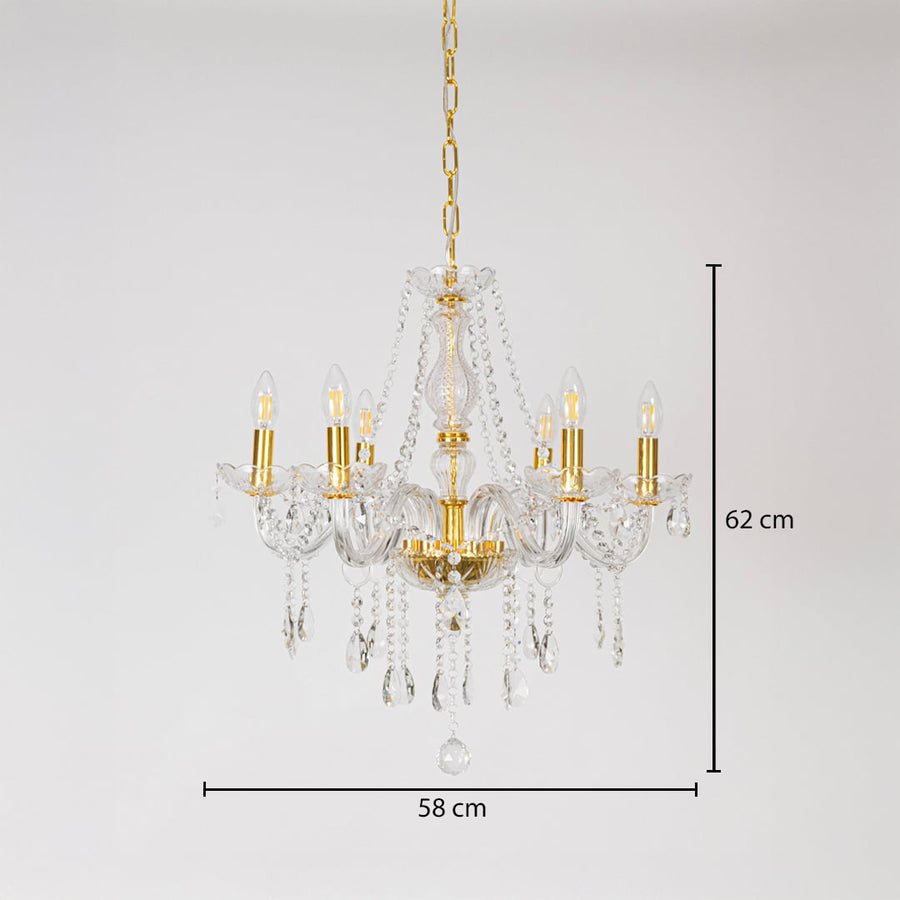 Gold chandelier with measurements 62 cm height and 58 cm width showing crystal design on white background.
