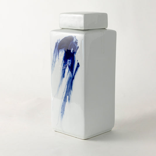 White ceramic decorative jar with blue koi artwork for elegant shelf styling and modern home decor displays.