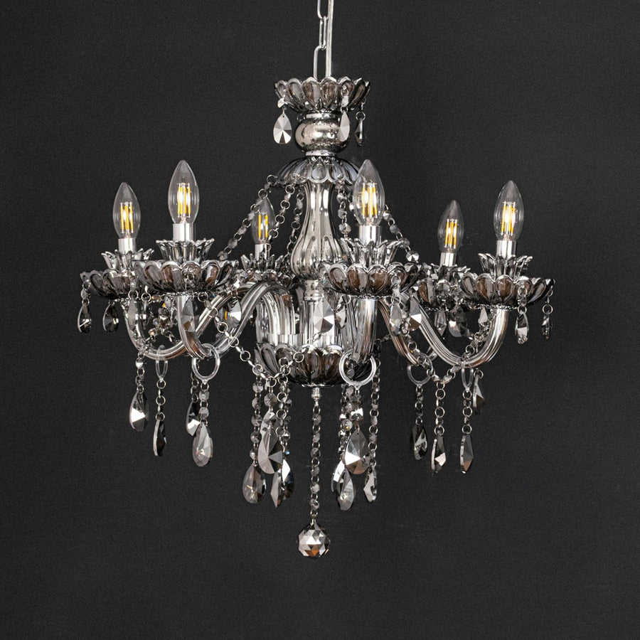 Black crystal chandelier displayed on black background showcasing bold luxury style for elegant ceiling decor.