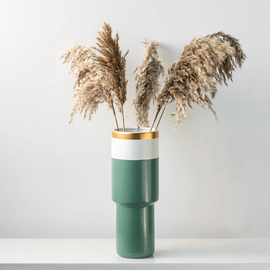 Tall green ceramic vase with white band and gold rim placed in a bright interior perfect for living rooms consoles and modern decor accents.