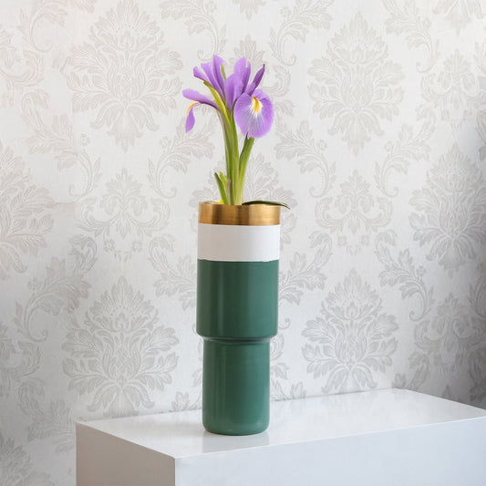 Green ceramic vase with white band and gold rim styled in a modern interior setting perfect for shelves tables and elegant home decor.