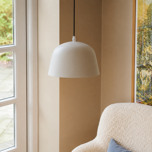 Lifestyle image of ambit muuto pendant lamp in white for elegant dining room decor styling and modern home room lighting.