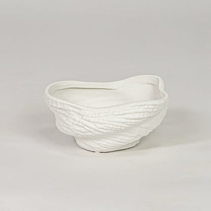 Modern white ceramic decor bowl with textured surface isolated on clean background stylish decorative bowl for center table and shelf decor.
