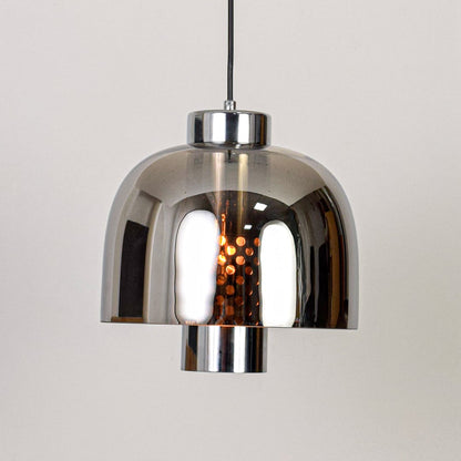Smoke glass and chrome metal pendant light designed for modern dining room and home decor spaces.