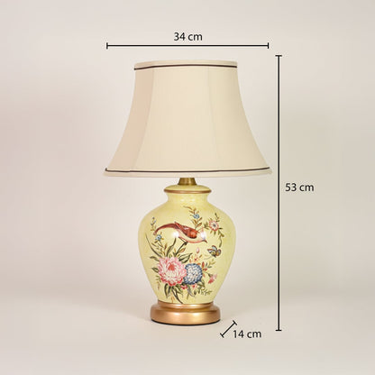 Yellow ceramic table lamp showing 53 cm height 34 cm shade width and 14 cm base diameter ideal for bedside tables.