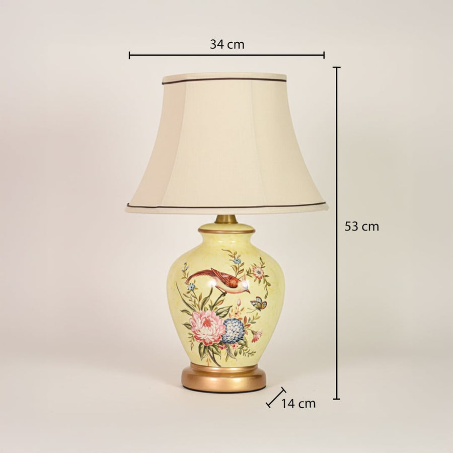 Yellow ceramic table lamp showing 53 cm height 34 cm shade width and 14 cm base diameter ideal for bedside tables.