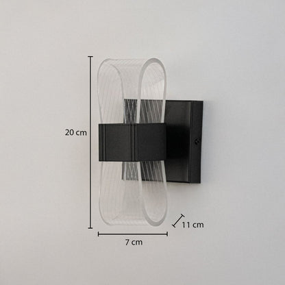 Black wall light with curved acrylic shade shown with height 20 cm width 7 cm and depth 11 cm.