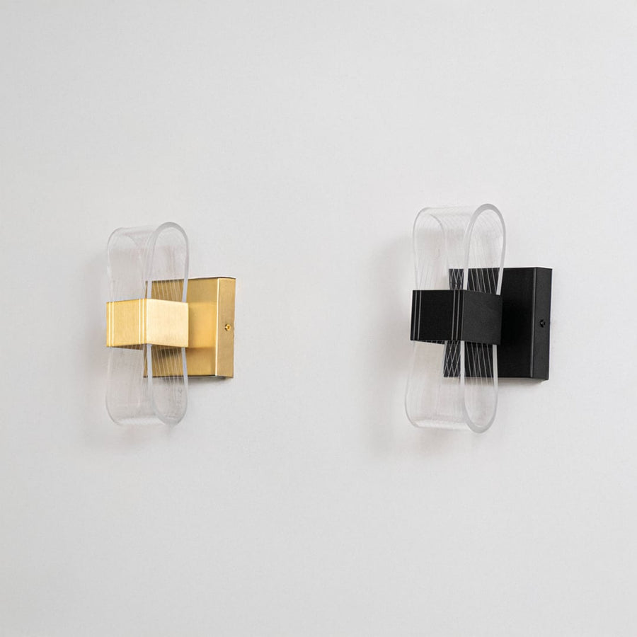 Black wall lights with curved acrylic diffusers shown on a white background with lights turned off.