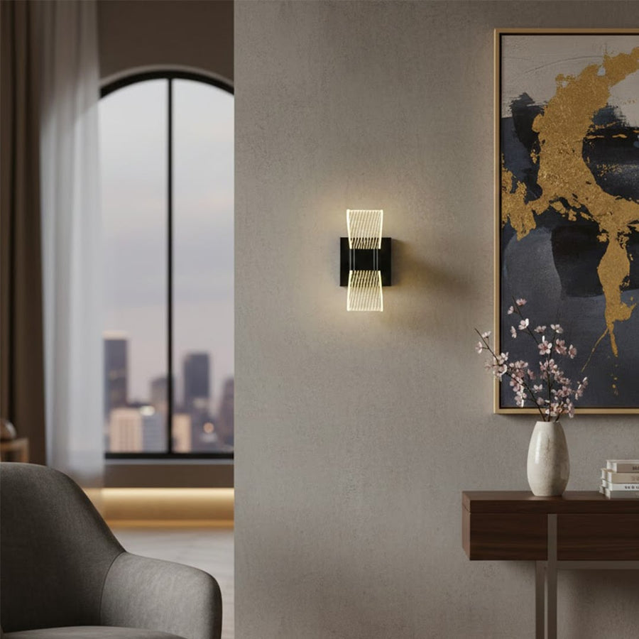 Modern black wall light lifestyle image in luxury living room with warm ambient lighting and elegant wall decor.