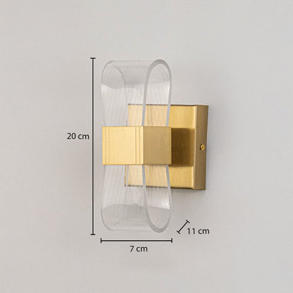 Gold metal wall light with ribbed clear glass shade shown with 20 cm height and 7 cm width for precise sizing.