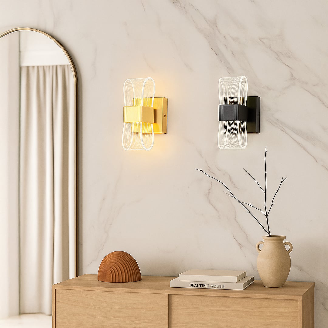 Gold metal wall light with ribbed clear glass shade adding warm ambient lighting to a modern stylish interior.