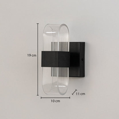 Black wall light with ribbed clear glass shade shown with 19 cm height and 10 cm width for precise sizing.
