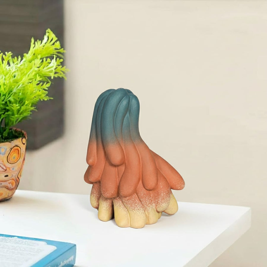 Abstract multicolor ceramic decor object styled on console modern artistic sculptural accent for living room shelf styling home.