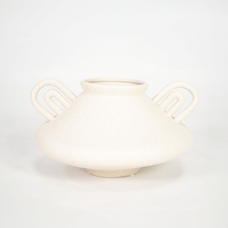 White matte ceramic planter vase for stylish console table placement and contemporary living room decor styling.