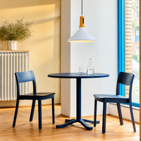 Lifestyle image of arden modern wooden pendant light in white for elegant dining room decor styling and modern lighting.