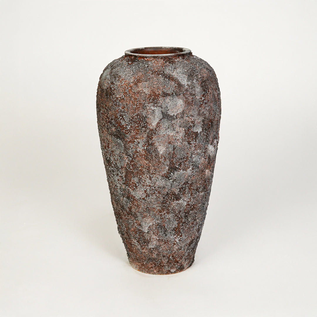 White background image of black ceramic decorative vase for elegant floor placement with textured matte finish.