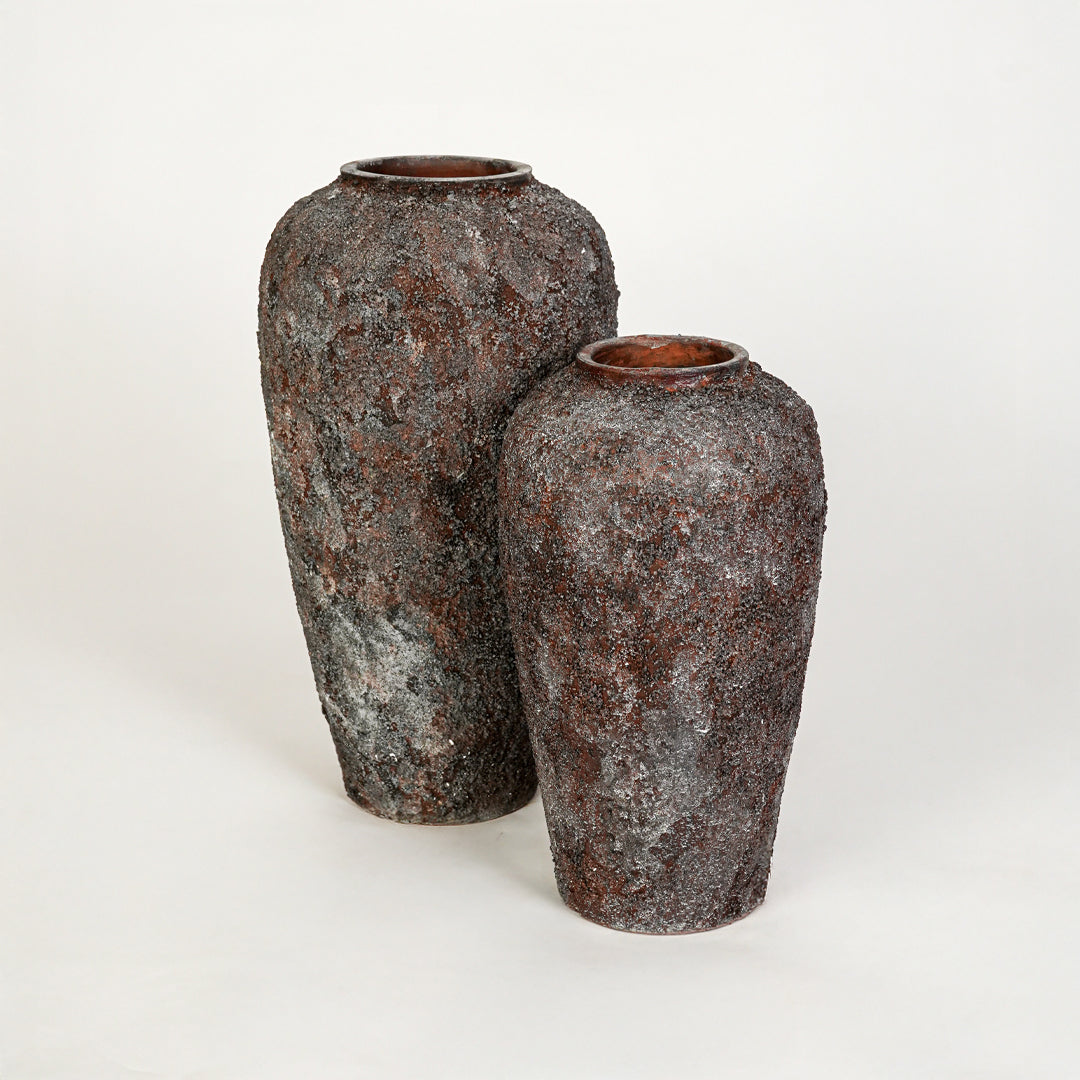 White background image of black ceramic floor vase set for modern decor styling with textured finish.