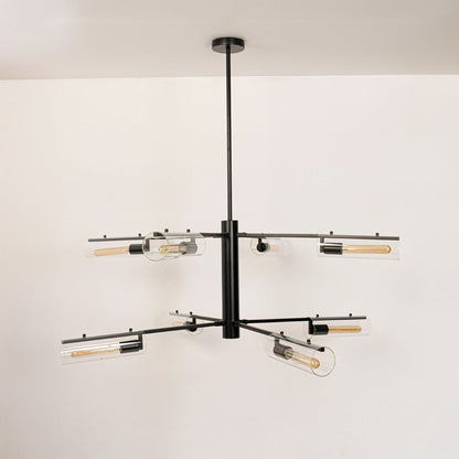 Contemporary black metal multi arm chandelier with clear glass tubular shades turned off displayed on pristine white background.