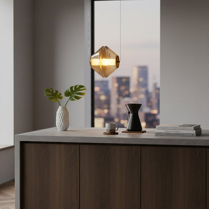 A modern dining space with a warm glowing hammered glass pendant light hanging above a table set with minimal decor creating a calm inviting atmosphere.