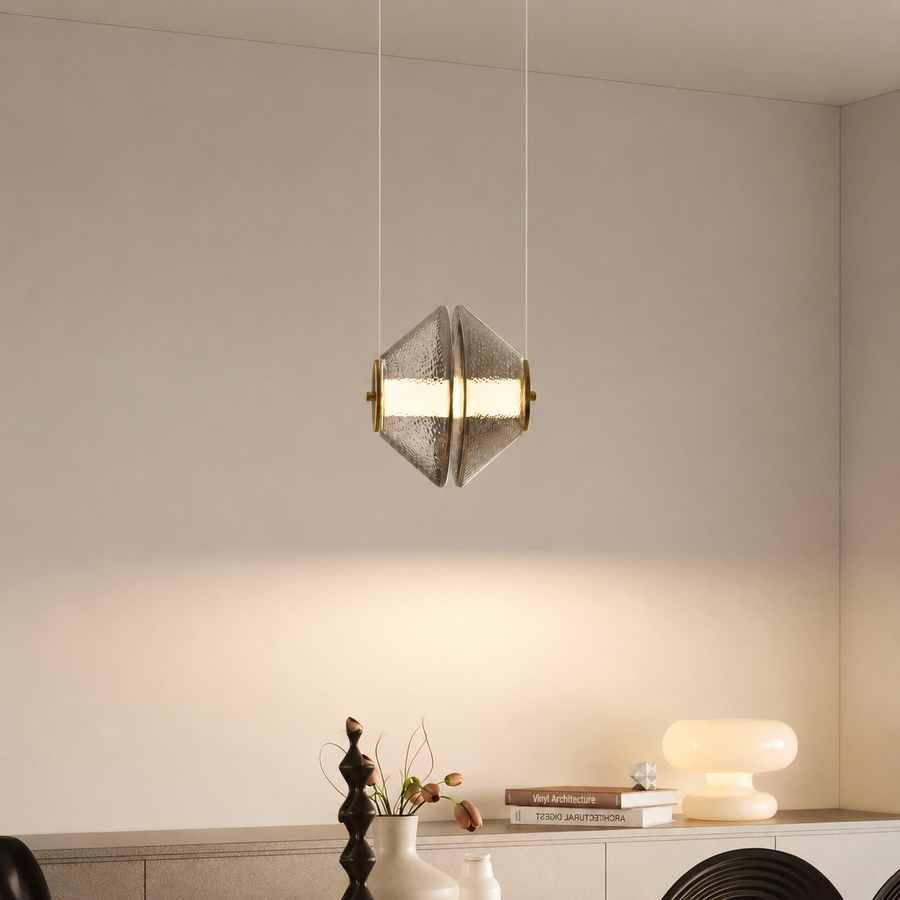 Lifestyle image of smoked led pendant light with chrome finish for elegant dining room decor styling and modern lighting.