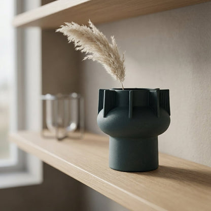 Green ceramic flower vase placed on wooden shelf modern decorative vase for living room decor styling.