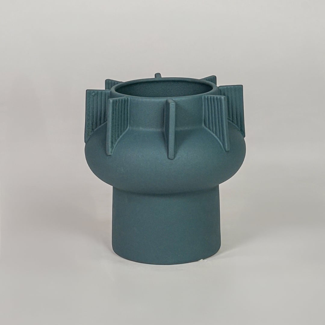 Green ceramic flower vase with textured finish modern decorative vase for shelf console table living room decor styling.