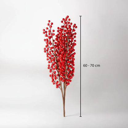 Vibrant red artificial winter berry branch stems showing a sixty to seventy centimeter height chart on white backdrop.