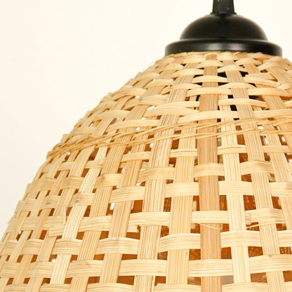 Closeup of handwoven bamboo pendant light showcasing natural texture and artisan details.