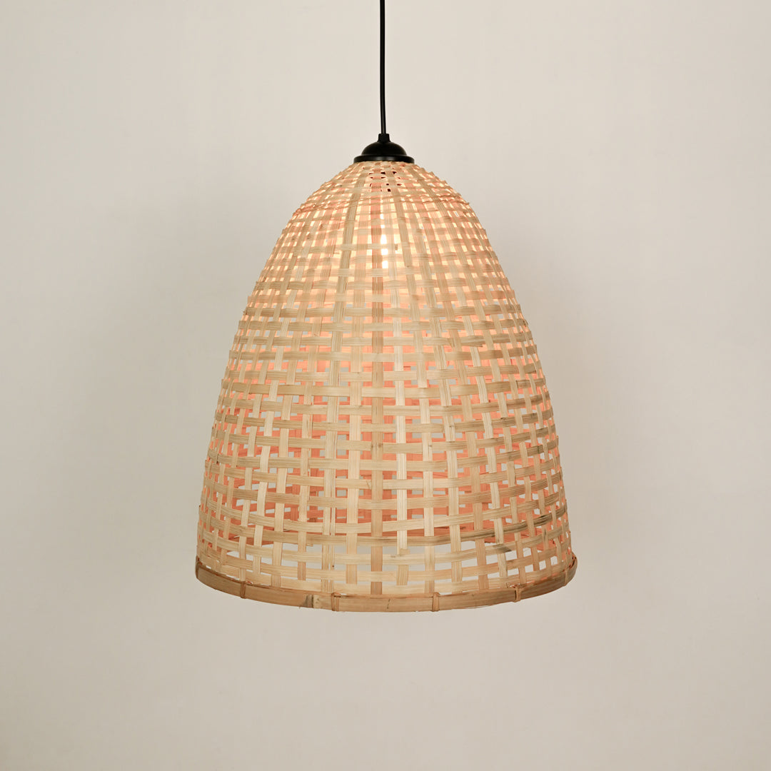 Handwoven rattan pendant light with natural finish crafted for warm bohemian home interiors.
