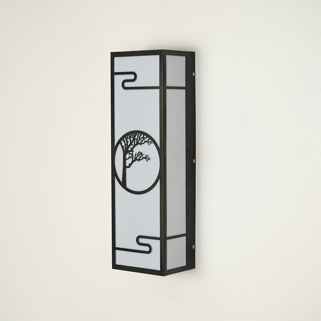Contemporary outdoor wall light with black metal frame and decorative design on clean background perfect for exterior home decor lighting.

