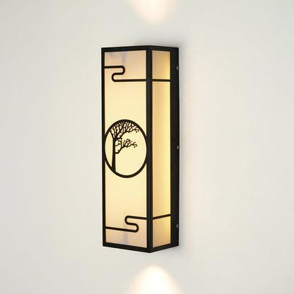Modern outdoor wall sconce with rectangular metal frame and patterned glass panel on neutral background ideal for porch or entry lighting.