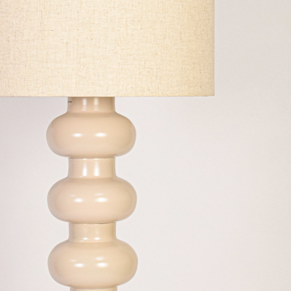 Closeup 2 showing detailed stacked base profile and subtle surface texture of the floor lamp highlighting premium build and modern design.