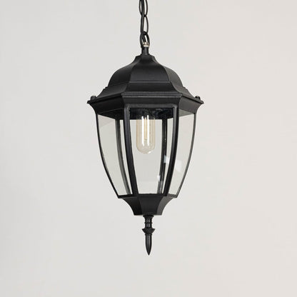 Outdoor hanging lantern light turned off on white background displaying clean glass and matte finish.