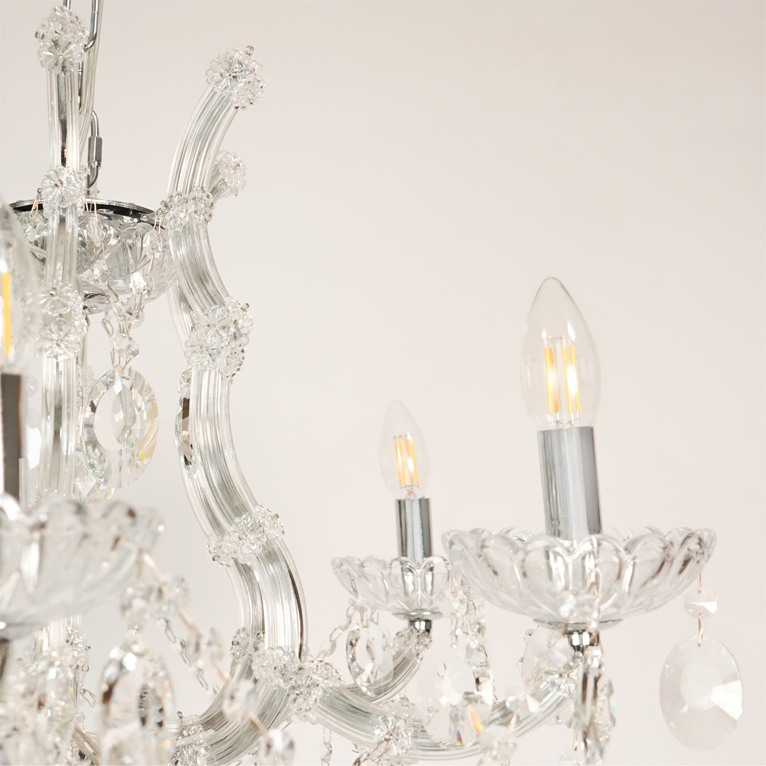 Closeup image of victorian chandelier for modern dining room decor styling with elegant detailings.