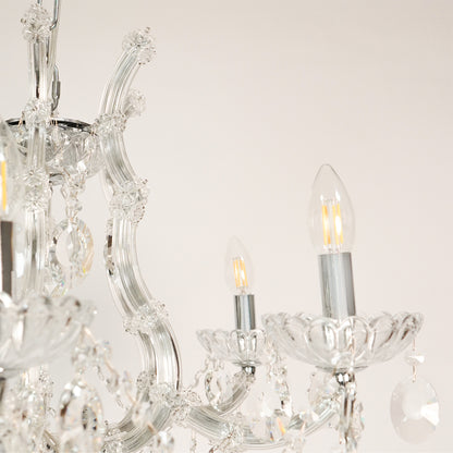 Closeup image of victorian chandelier for modern dining room decor styling with elegant detailings.