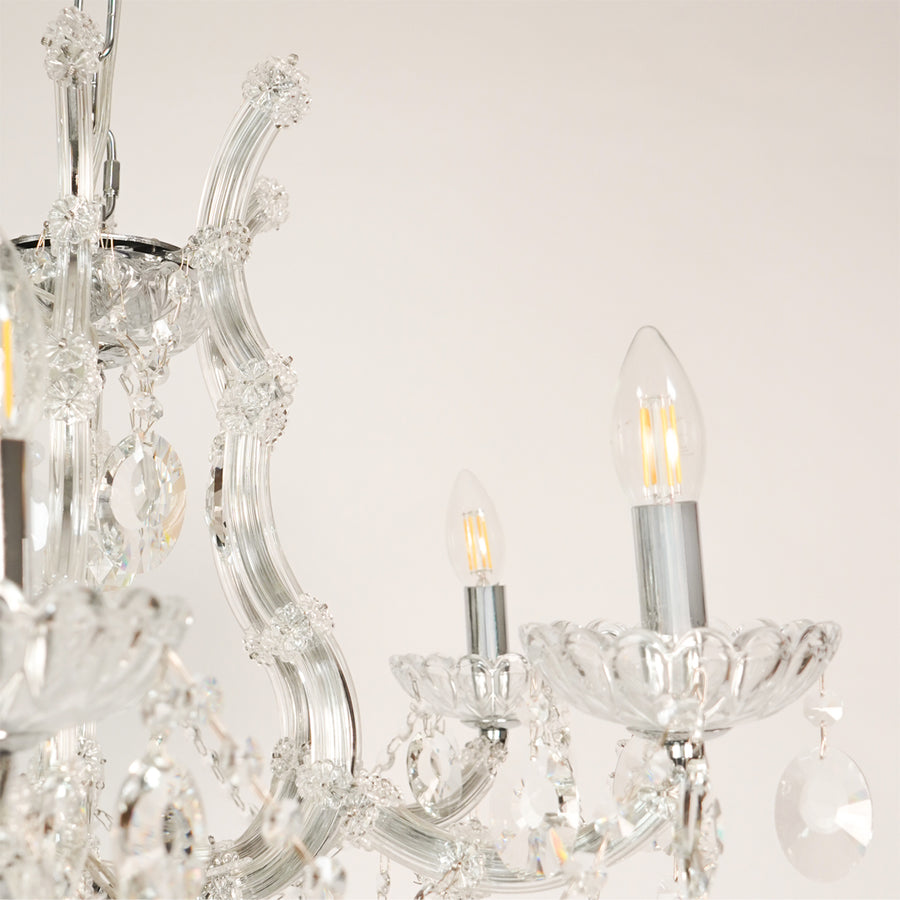 Closeup image of victorian chandelier for modern dining room decor styling with elegant detailings.