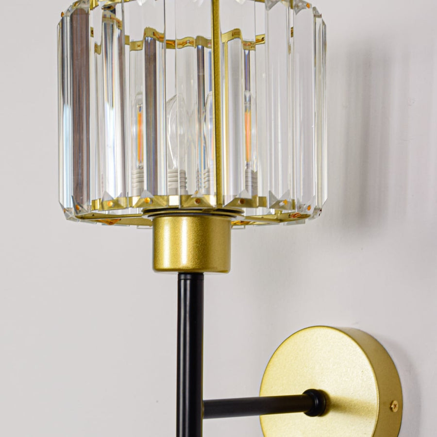Closeup of black and gold metal wall lamp showing sleek finish refined edges and premium build for elegant indoor wall lighting decor.