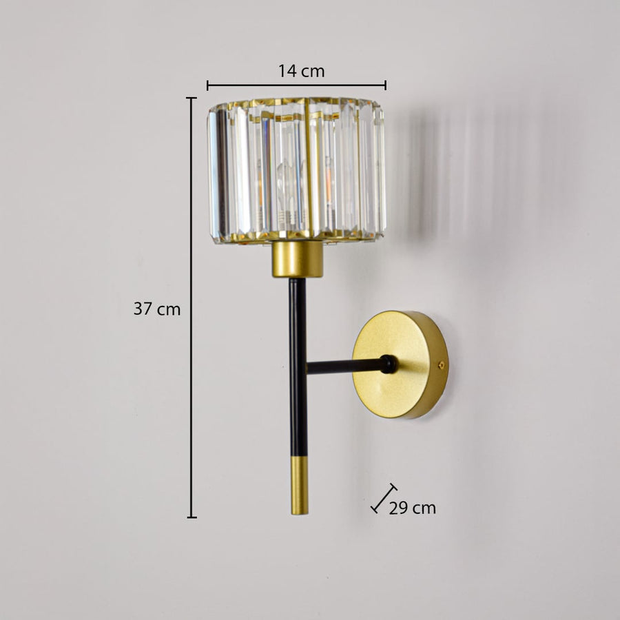 Gold and black metal wall light with crystal shade measuring 37 cm height 14 cm width and 29 cm projection for walls.